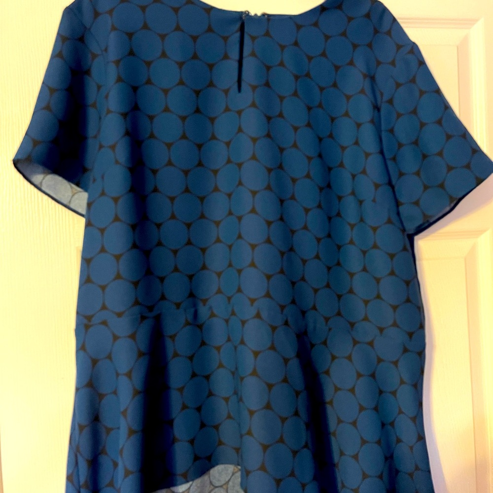 Blue blouse with ornamental circles